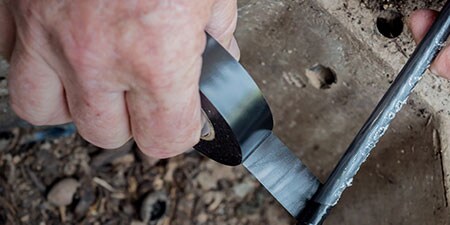 image of 3M General Use Vinyl Electrical Tape being used on cable
