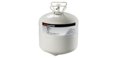 Solvent- and water-based adhesives use a liquid carrier to apply the adhesive to the substrates. Image of a spray adhesive in a cannister.
