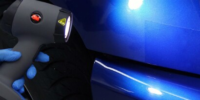 Alt Text for Sun Gun - 3m sun gun being used on paint coat
