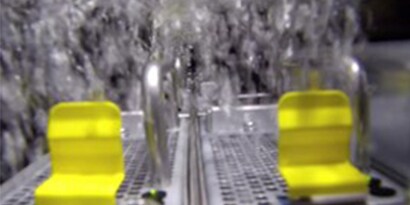 Go Pro camera shot of bubbling data servers immersed in Novec Engineered Fluids in liquid immersion cooling application.
